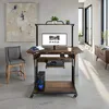 A home office setup with a computer desk, monitor, keyboard, computer tower, and a chair. Produktbild-Vorschau