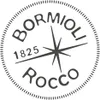 A circular logo with text and a compass rose. Anteprima dell’immagine prodotto