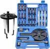 A tool kit for removing bearings, with a puller tool on the left and the rest of the kit in a blue case on the right. Podgląd zdjęcia produktu