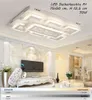 A modern living room with a large LED ceiling light, a TV, and a console table. Produktbild-Vorschau