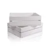 A stack of three white wooden crates on a white background. Produktbild-Vorschau