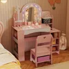 A child's pink vanity set with a mirror, chair, and shelves, set up in a bedroom. Náhled obrázku produktu