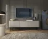 A modern living room with a TV stand, TV, lamp, and artwork. Náhled obrázku produktu