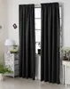 A room interior with black curtains covering a window. Produktbild-Vorschau