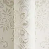 A close-up view of textured wallpaper with a damask pattern. Produktbild-Vorschau