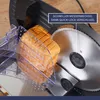 A close-up shot of a bread slicer with a loaf of bread being sliced. Produktbild-Vorschau