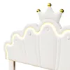 A close-up view of a white upholstered headboard with a crown detail and integrated LED lighting. Anteprima dell’immagine prodotto