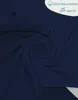 A crumpled dark blue fabric, likely a pillowcase or textile, with a circular swirl pattern. A white oval overlay in the top right corner contains text and icons. Produktbild-Vorschau