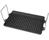 A cast iron grill plate with handles, shown from a diagonal angle against a white background. Produktbild-Vorschau