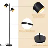 A floor lamp with two adjustable heads, shown with close-up details of its lampshade, connection joint, and base, along with descriptive text. Produktbild-Vorschau
