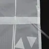 A close-up view of a white sheer curtain with a silver geometric triangle pattern. Produktbild-Vorschau