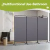 A bathroom scene with a three-panel room divider set up in front of a bathtub. Produktbild-Vorschau