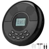 A black portable CD player with a digital display and control buttons, shown with included accessories. Produktbild-Vorschau