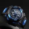 A close-up shot of a digital sports watch with a black and blue design, resting on a dark surface. Produktbild-Vorschau