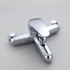 A chrome-plated bathtub and shower faucet is shown against a plain gray background. Podgląd zdjęcia produktu