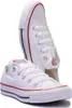 A pair of white Converse ALL STAR OX UNI shoes. Voir les images du produit