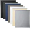 A collection of roller blinds in various colors, arranged in a staggered formation. Produktbild-Vorschau