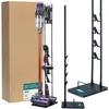 A Dyson vacuum cleaner and its accessories are displayed on a white background, along with packaging. Produktbild-Vorschau