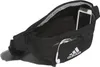 A black Adidas waist bag is shown with its main compartment open, revealing a smartphone inside. A pair of white earbuds is also visible, emerging from a smaller zippered pocket on the front of the bag. Voir les images du produit