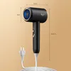 A black hairdryer with gold accents and a blue fan is shown against a light beige background. Dimensions are indicated by lines and text. Produktbild-Vorschau