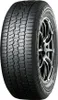 A close-up studio shot of a Yokohama Geolandar tire mounted on a silver and black alloy wheel. Náhľad obrázku produktu
