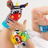 4-tlg. Baby Rassel Set mit Socken und Handgelenkbändern Produktbild-Vorschau 2