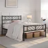 A bedroom scene with a metal bed frame, bedding, and decorative items. Produktbild-Vorschau