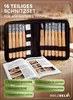 A set of wood carving tools laid out with an open instruction manual and storage case. Produktbild-Vorschau