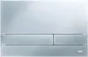 A close-up studio shot of a toilet flush plate. Produktbild-Vorschau