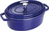 A blue oval Staub cast iron pot with a silver knob on its lid, shown from a slightly elevated side angle against a white background. Náhled obrázku produktu