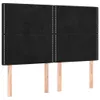 A black upholstered headboard with wooden legs against a white background. Produktbild-Vorschau