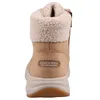 A back view of a tan Skechers boot with a cream-colored fuzzy lining. Voir les images du produit