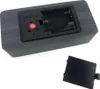 The back of a digital clock showing the battery compartment and the removed battery cover. Voir les images du produit