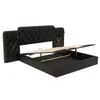 A black upholstered bed frame with the mattress support mechanism lifted to reveal storage space underneath. Produktbild-Vorschau