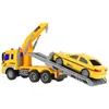 A yellow toy tow truck with a yellow toy taxi on its platform. Anteprima dell’immagine prodotto
