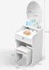 A white vanity table with a mirror and a stool, displaying various cosmetic products. Voir les images du produit