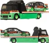 Two toy car carrier trucks, each with a toy car on the trailer, displayed against a white background. Náhľad obrázku produktu