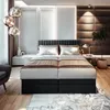 A luxurious bedroom with a large boxspring bed as the focal point. Podgląd zdjęcia produktu
