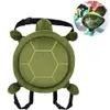 A green turtle-shaped hip protector cushion with straps. Podgląd zdjęcia produktu