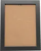 A black picture frame with a brown insert, viewed from the back. Produktbild-Vorschau