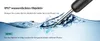A close-up of an ear cleaning tool being dipped into water, with text overlays describing its features. Produktbild-Vorschau