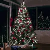 A decorated Christmas tree with lights and bows, set up indoors near a window at night. Anteprima dell’immagine prodotto