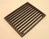 A cast iron grate on a light background. Podgląd zdjęcia produktu