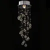 A crystal chandelier with multiple hanging strands of crystal beads and spheres, against a black background. Produktbild-Vorschau