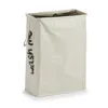 A beige laundry basket with black text on a white background. Anteprima dell’immagine prodotto