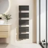 A modern bathroom with a vanity, sink, mirror, and a black towel radiator. Náhled obrázku produktu