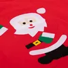 A close-up view of a felt Santa Claus applique on a red background. Produktbild-Vorschau