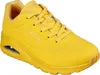 A single yellow Skechers sneaker is shown from a side angle against a white background. Podgląd zdjęcia produktu