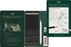 A Faber-Castell Pitt Graphite Matt set is displayed in its open tin packaging, with pencils and accessories laid out. Podgląd zdjęcia produktu