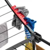Close-up of socks and a towel hanging on a drying rack. Produktbild-Vorschau